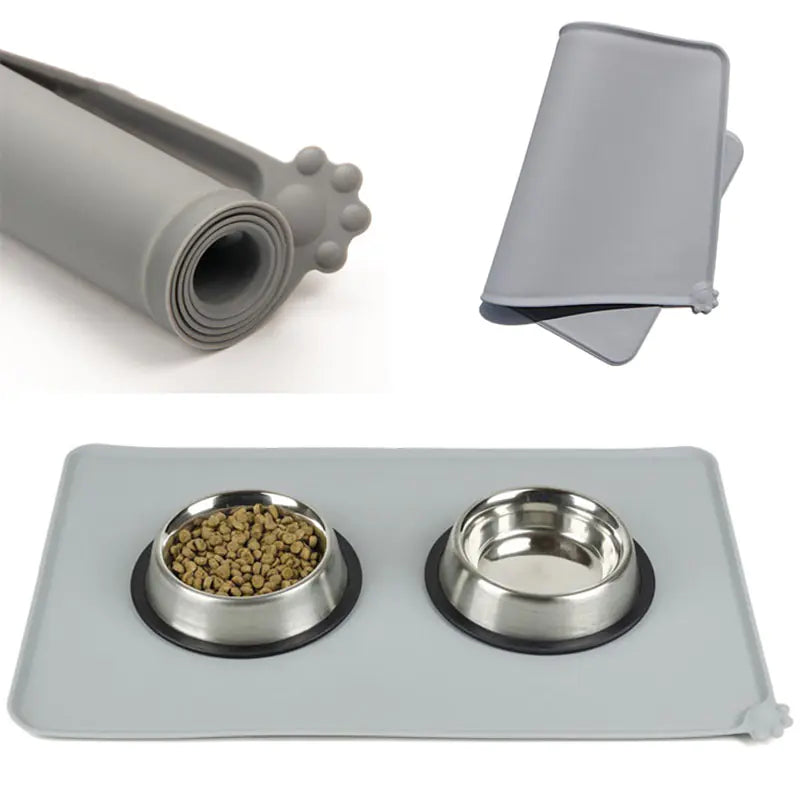 Pet feeding station with two bowls, a mat, and a cover on a white background