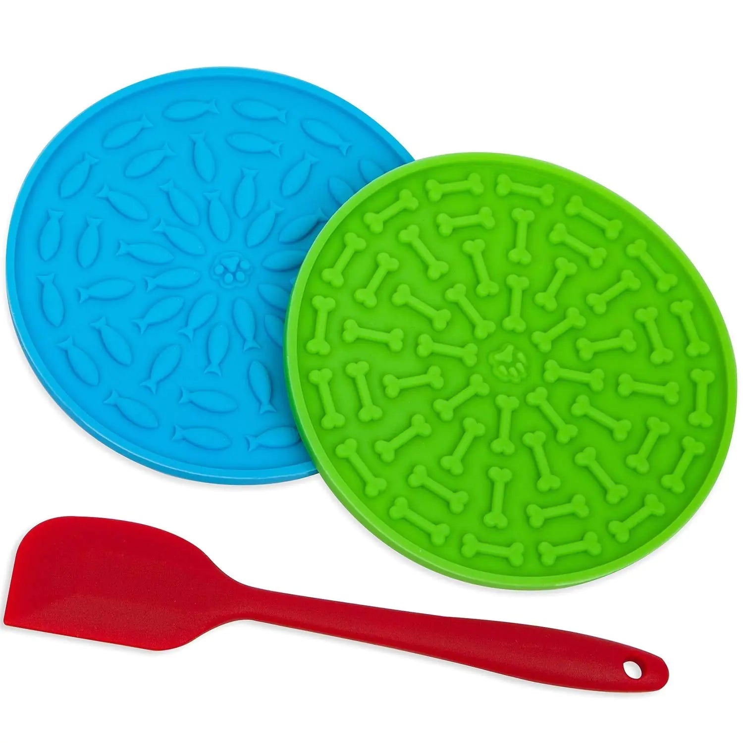 Two silicone mats with bone pattern and a red spatula on a white background